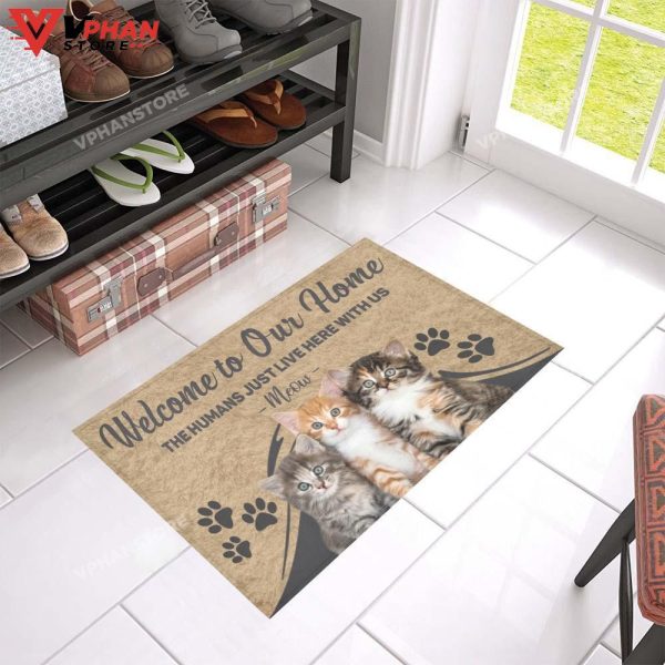 The Humans Just Live Here With Us Cat DoorMat